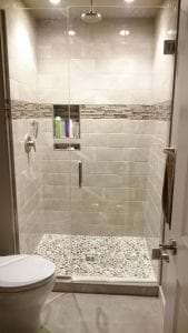 glass door tall shower with tiled walls 3